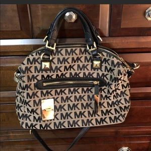Michael Kors bag with Crossbody strap.